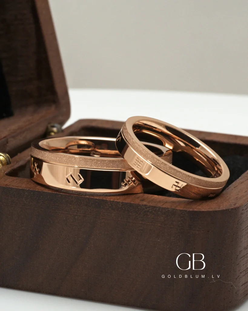 Zelta laulību gredzeni ar latvju zīmēm